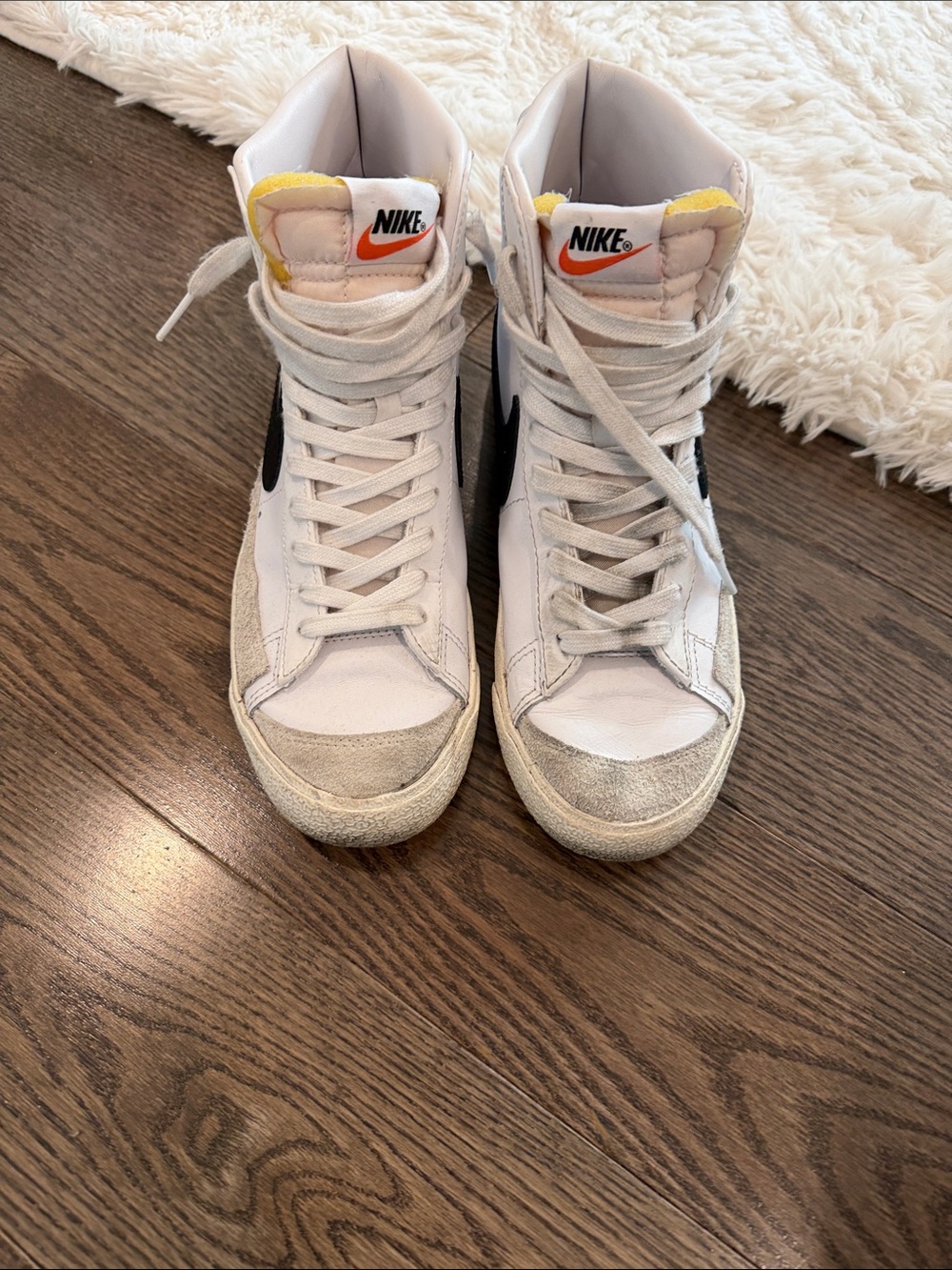 Nike White High-Top Sneakers with Black Swoosh and Yellow Tongue Accent, BLAZERS